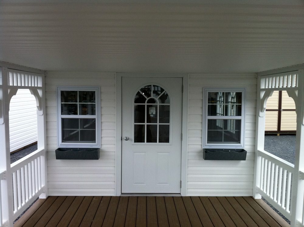 Pool House Shed doors and window covered entrance
