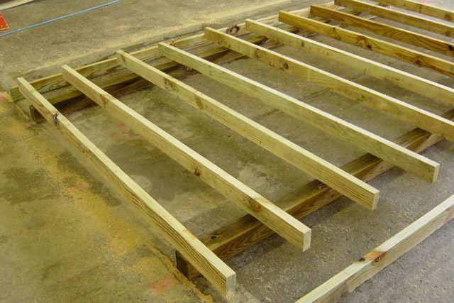 shed floor floor joists on 4c4 pressure treated lumber